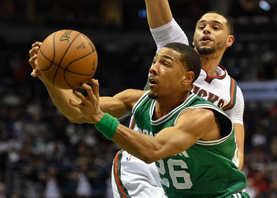 Celtics guard Phil Pressey (26) takes a shot against <a class="link " href="https://sports.yahoo.com/nba/teams/milwaukee/" data-i13n="sec:content-canvas;subsec:anchor_text;elm:context_link" data-ylk="slk:Milwaukee Bucks;sec:content-canvas;subsec:anchor_text;elm:context_link;itc:0">Milwaukee Bucks</a> guard Tyler Ennis (11) in the third quarter at BMO Harris Bradley Center. Credit: Benny Sieu-USA TODAY Sports