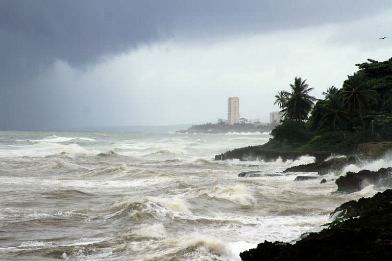 View of choppy seas in front of Santo Domingo's Malecon seafront in the Dominican Republic. Hundreds of thousands of Haitians living in squalid makeshift camps hunkered down Wednesday as lashing rain and wind from the outer bands of Tropical Storm Emily hit the quake-stricken country