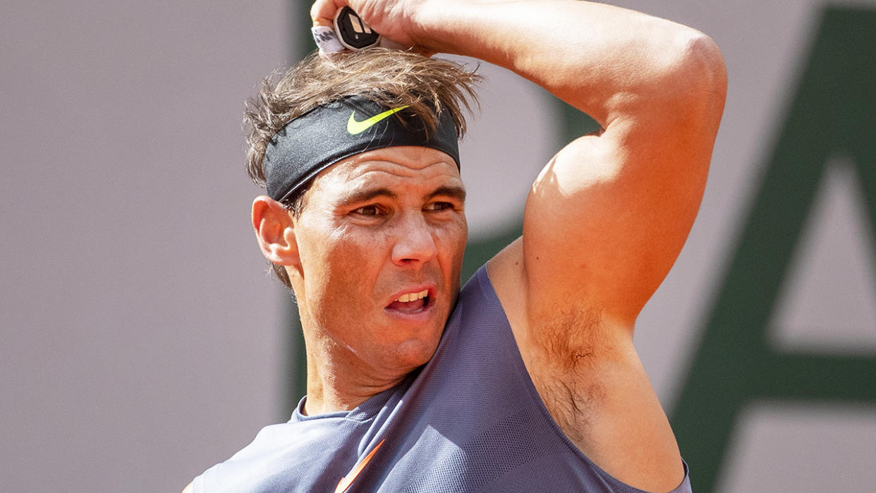 Rafael Nadal is pictured playing a shot during a practice match prior to the French Open.