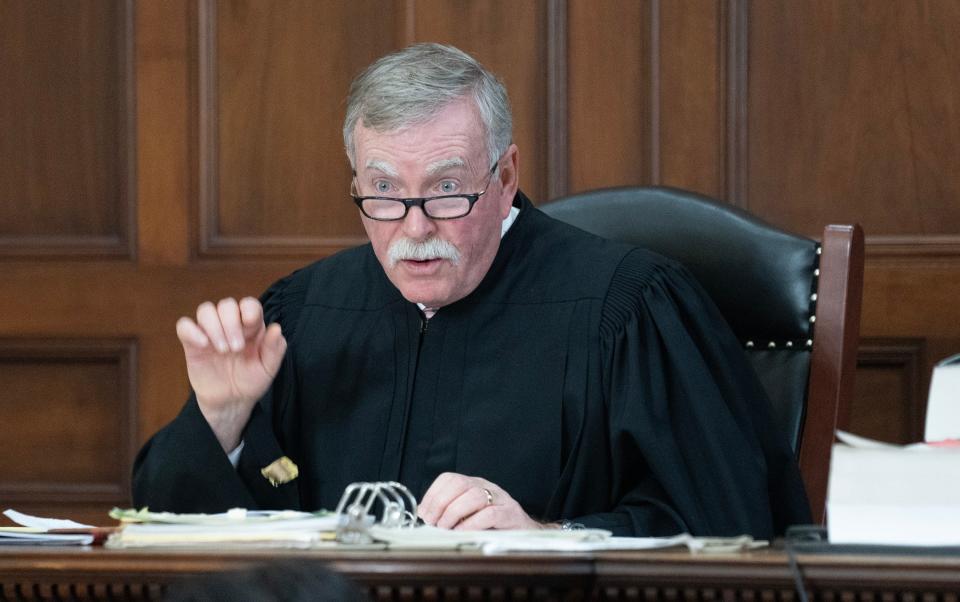Retired Franklin County Common Pleas Judge Daniel Hogan, serving as a visiting judge after the lone Madison County judge recused himself from the Joel Cutler criminal case, speaks during Cutler's plea hearing Tuesday, Nov. 21, 2023 in Madison County Common Pleas Court. Despite pleas from victim Elsie Baird, Hogan accepted the plea deal between Madison Counthy prosecutors and Cutler's defense attorney.