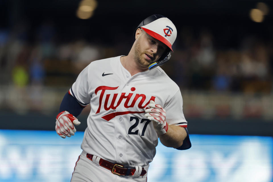 Minnesota Twins' Ryan Jeffers runs the bases on his two-run home run against the Texas Rangers in the eighth inning of a baseball game Thursday, Aug. 24, 2023, in Minneapolis. (AP Photo/Bruce Kluckhohn)