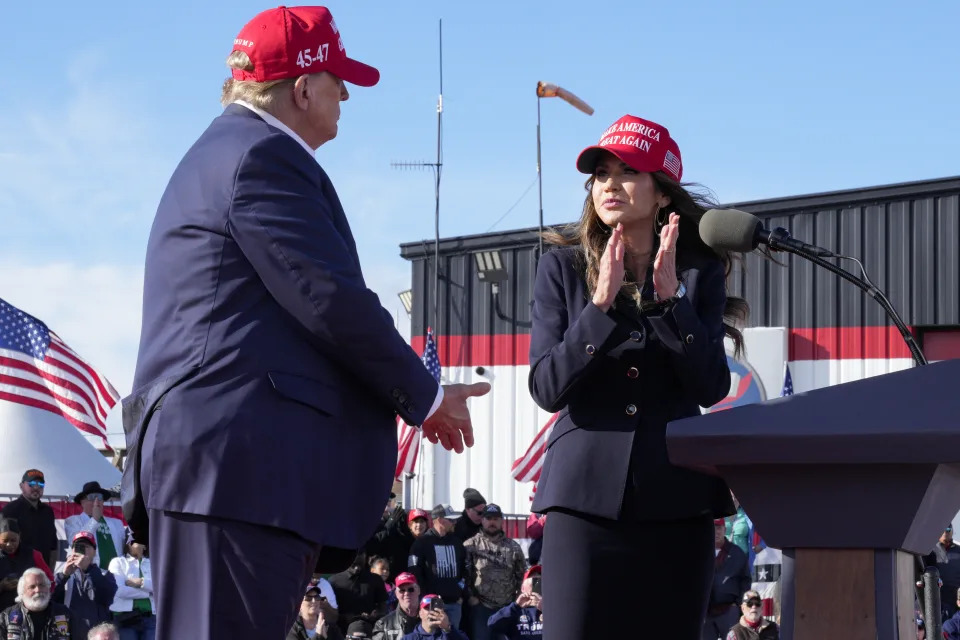 Donald Trump and Noem at a campaign rally in Vandalia, Ohio, in March