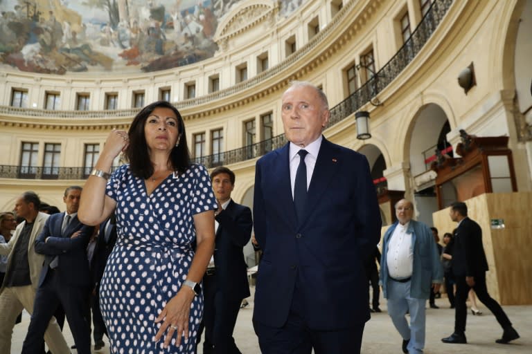 Paris Mayor Anne Hidalgo and French billionaire Francois Pinault at the Bourse de Commerce on Monday, where Pinault intends to display his extensive modern art collection starting in early 2019