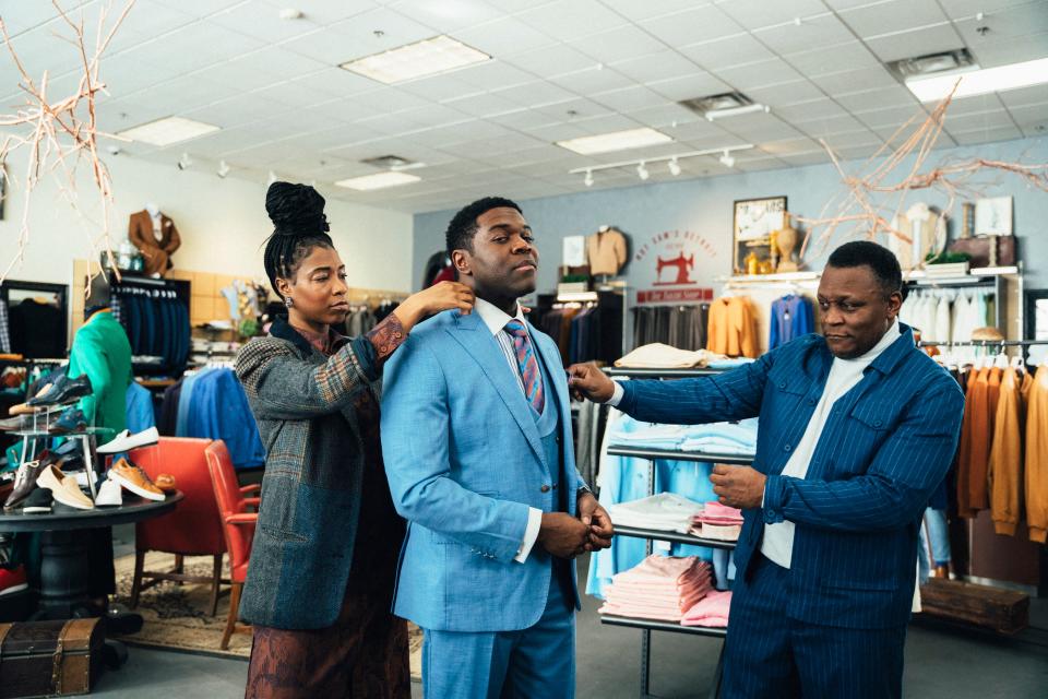 Sam Richardson and Lions great Barry Sanders at Hot Sam's, an iconic men's clothing store, as part of a promotional campaign for Detroit ahead of the NFL draft.
