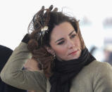 <div class="caption-credit"> Photo by: Chris Jackson/Getty Images</div>But two months before her wedding she learned not all fashion has a royal function. At an official waterside event on a windy day, Kate's pheasant-feathered Vivien Sheriff fascinator made for some odd photo ops as she struggled to keep it in place. <br>