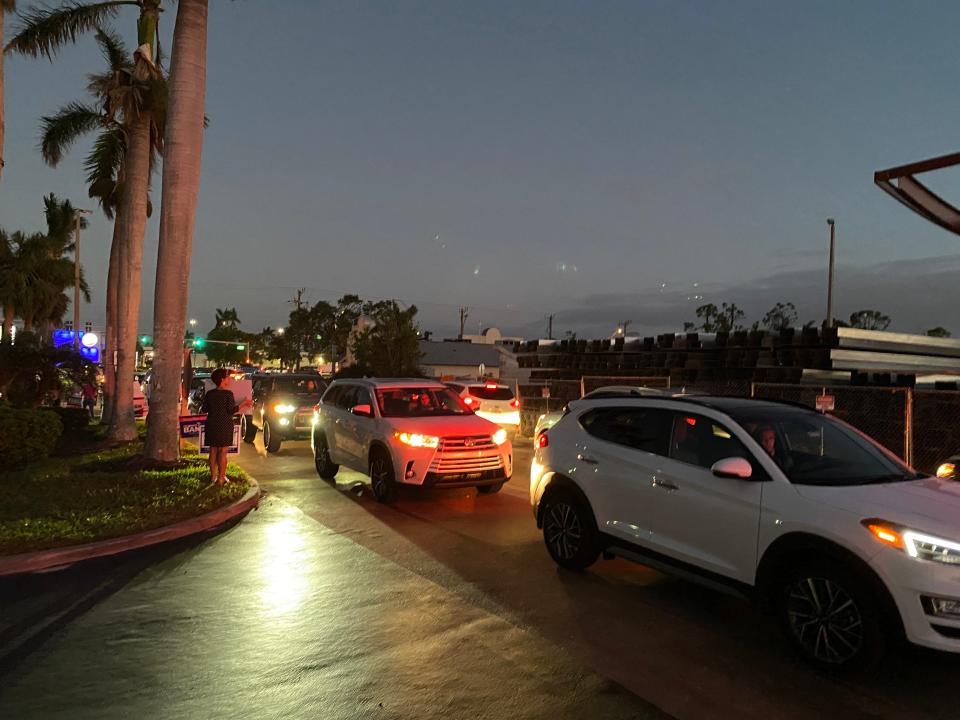 Cars cram the small parking lot of the Lee County Elections Center during the final hour of the 2022 Midterm Elections in Fort Myers.