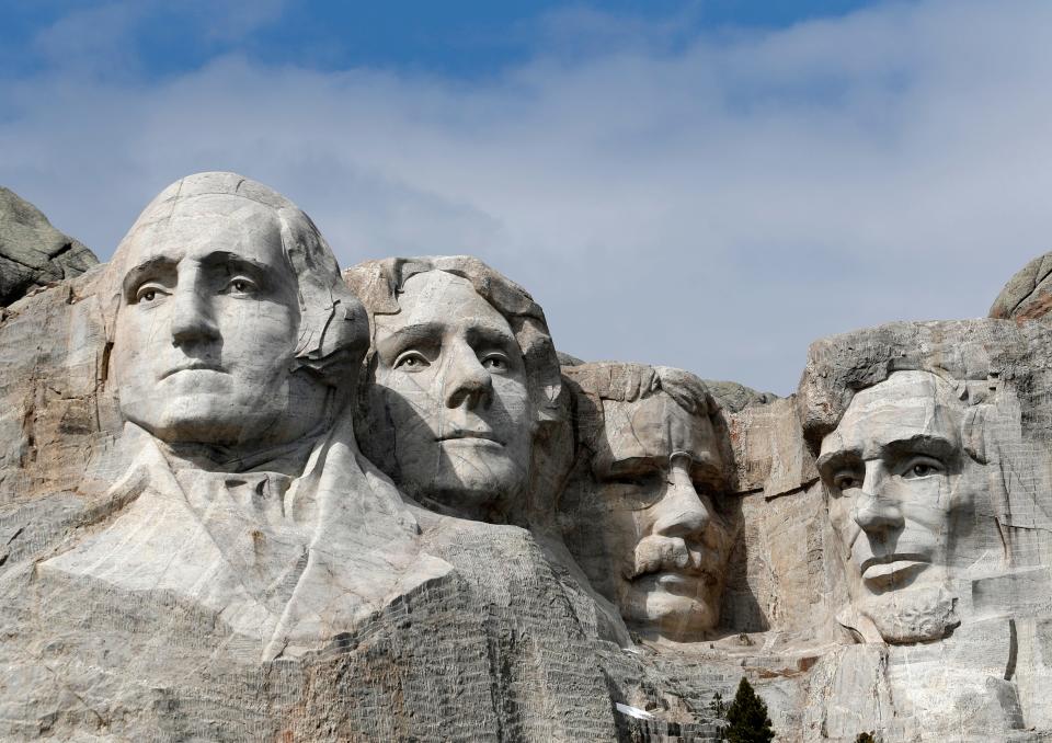 Bearing the likenesses of four United States chief executives, Mount Rushmore is pictured in 2019 in Keystone, South Dakota. Presidents Day, which is Monday, serves as a day off for federal workers and typically signals the start of many retails sales and deals.