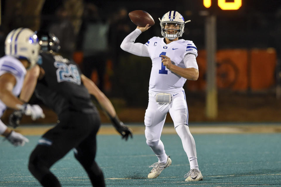 BYU quarterback Zach Wilson drops back to pass during the first half of an NCAA college football game against Coastal Carolina, Saturday, Dec. 5, 2020, in Conway, S.C. (AP Photo/Richard Shiro)