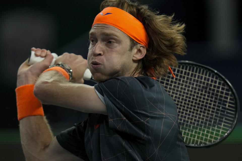 Andrey Rublev of Russia returns a shot to Tommy Paul of the United States during the 4th round of the men's singles match in the Shanghai Masters tennis tournament at Qizhong Forest Sports City Tennis Center in Shanghai, China, Wednesday, Oct. 11, 2023. (AP Photo/Andy Wong)