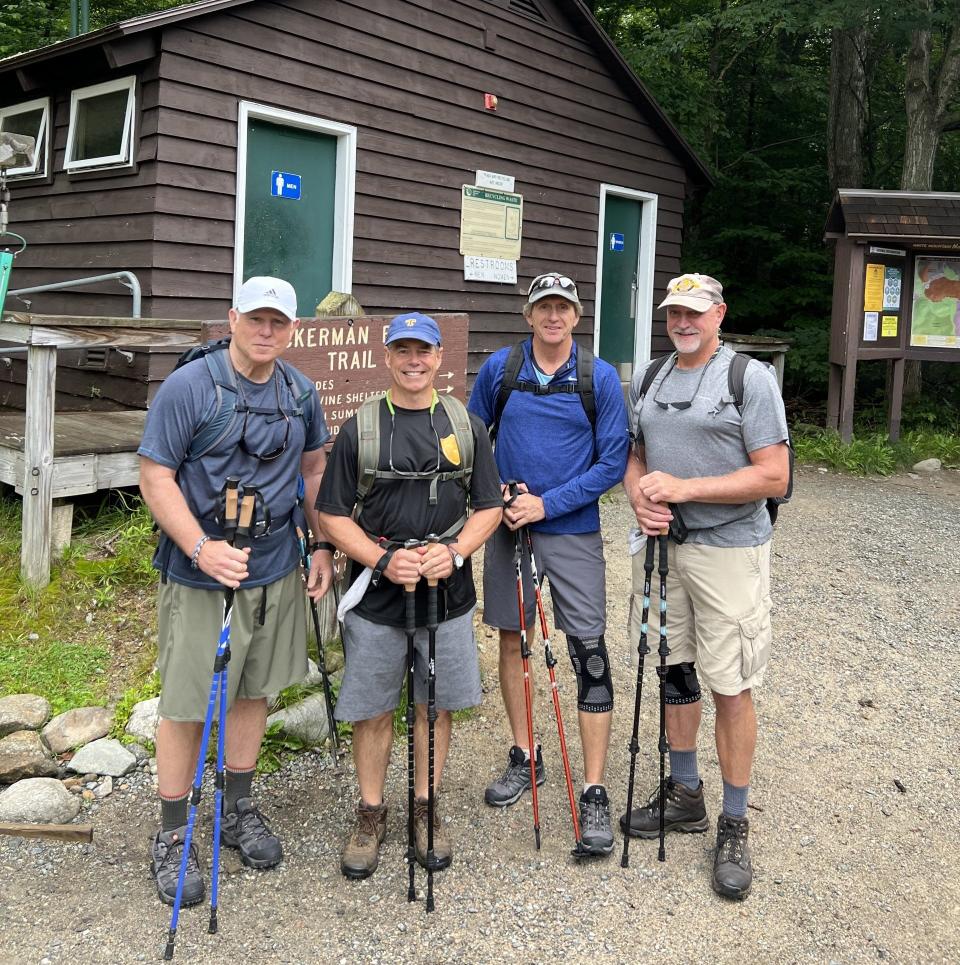 From left, Dave Buckley, Mike Elia, Peter Sanchioni and Steve Morelli prepare to climb Mt. Washington at the Tuckerman Ravine trailhead in New Hampshire on July 22.