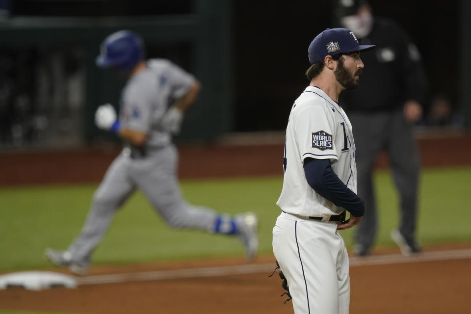 Los Angeles Dodgers' Austin Barnes rounds the bases after a home run off Tampa Bay Rays starting pitcher John Curtiss in Game 3 of the baseball World Series against the Tampa Bay Rays Friday, Oct. 23, 2020, in Arlington, Texas. (AP Photo/Eric Gay)