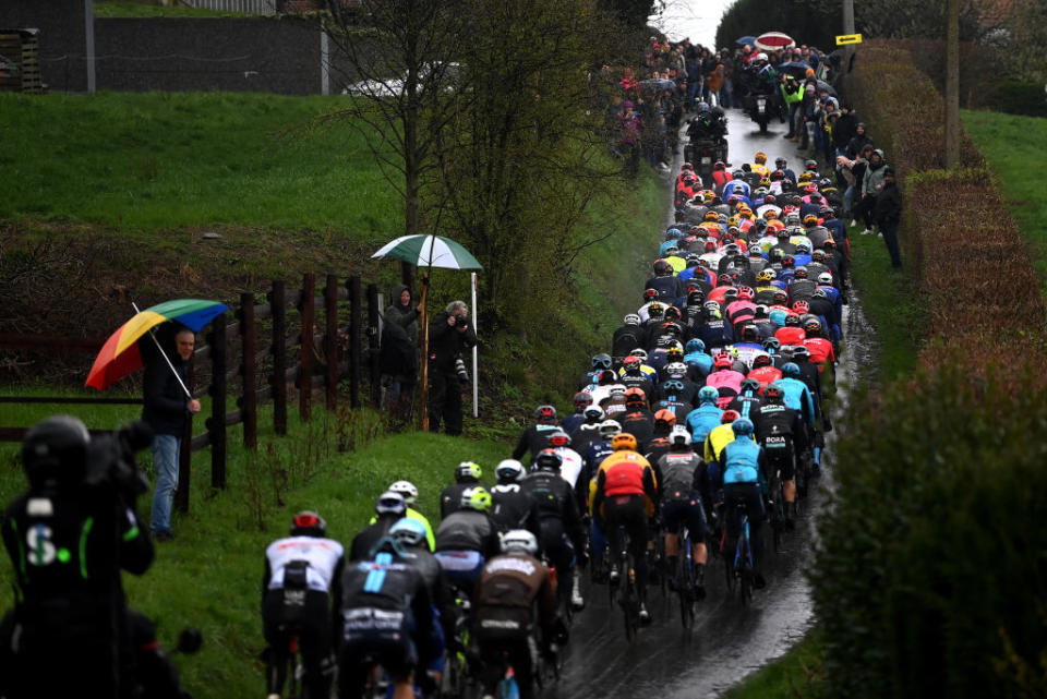 WEVELGEM BELGIUM  MARCH 26 A general view of the peloton passing through Scherpenberg hill during the 85th GentWevelgem in Flanders Fields 2023 Mens Elite a 2609km one day race from Ypres to Wevelgem  UCIWT  on March 26 2023 in Wevelgem Belgium Photo by Tim de WaeleGetty Images
