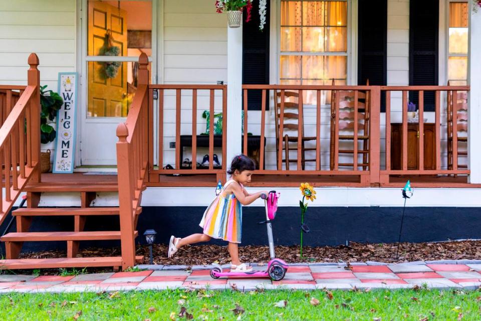 Four-year old Cassandra Bajana plays at her home in Henderson. The rate of Latino homeowners has steadily risen in the in North Carolina, with homeownership rates increasing in 95 of the state’s 100 counties over the last decade, Census data shows.