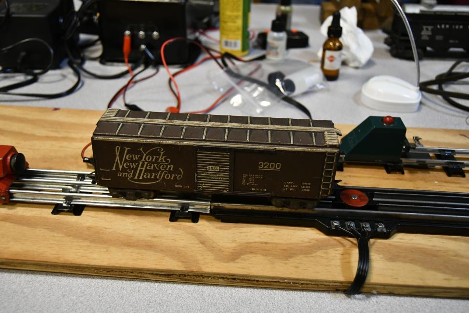 A model train car on display.