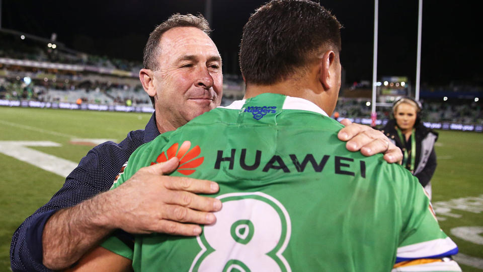 Ricky Stuart congratulates prop Josh Papalii after the preliminary final win over Souths.