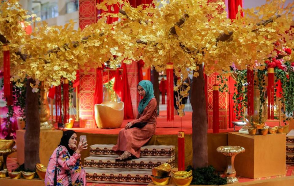 With gold signifying prosperity, the colour plays a significant role for decorations at the Ipoh Parade shopping centre. — Picture by Farhan Najib