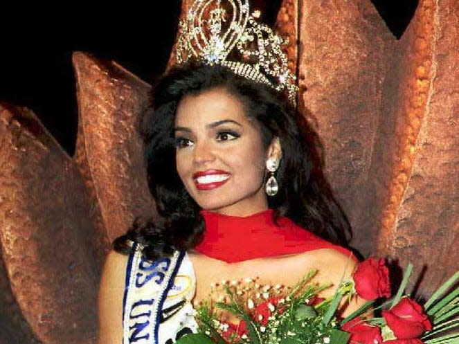 Miss USA, Chelsi Smith is crowned the Miss Universe 95 at the Windhoek Country Club 13 May in Namibia during a live telecast. The two runners-up in the contest were Miss India, Manpreet Braar and Miss Canada, Lana Buchenberger