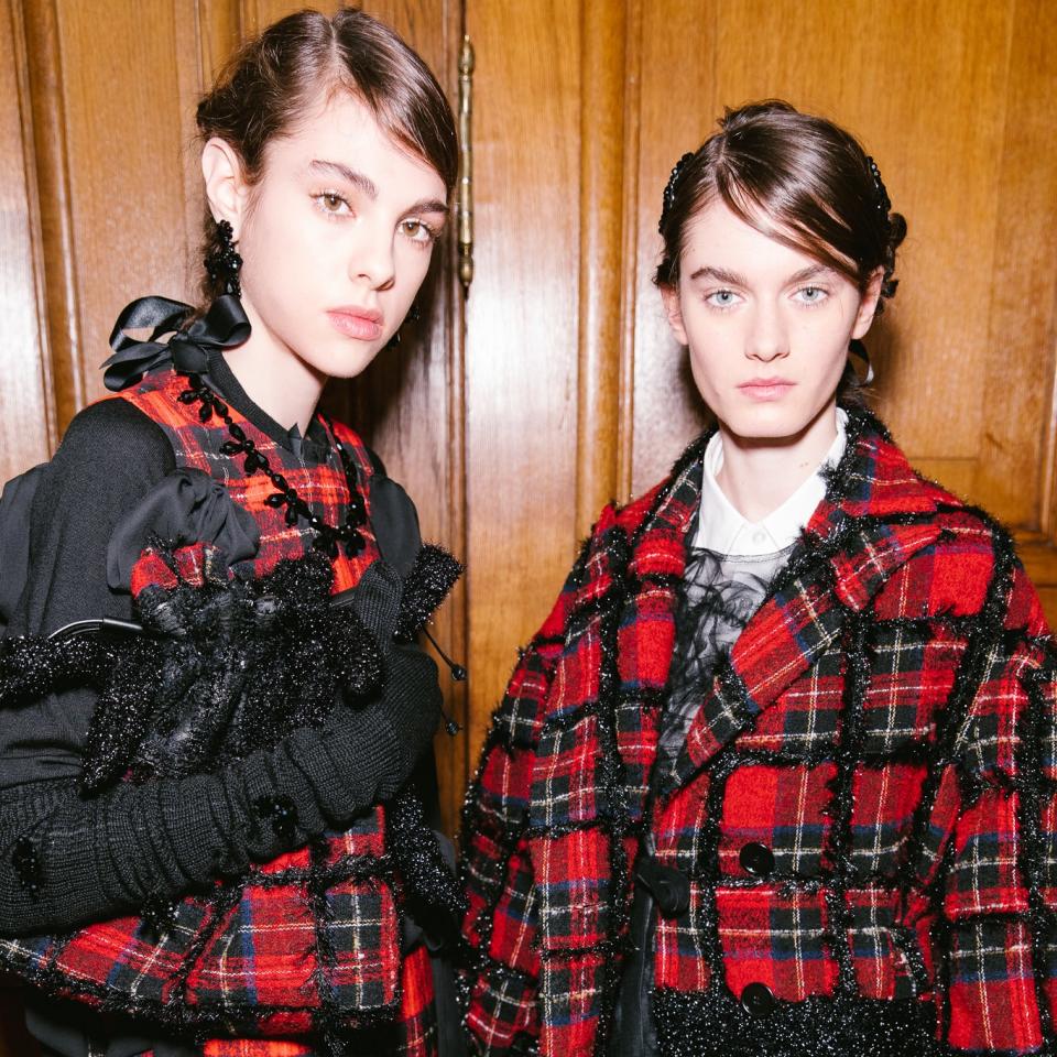 Today in London, models at Simone Rocha's Fall 2018 show wore a bevy of braids and bows that were equal parts pretty and irreverent.