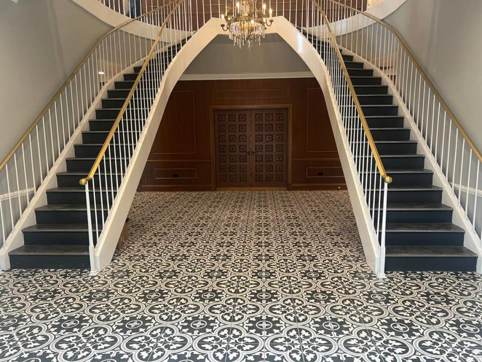 Twin staircases create an impressive welcome in the lobby of District Flats, new luxury apartments in downtown Pascagoula.