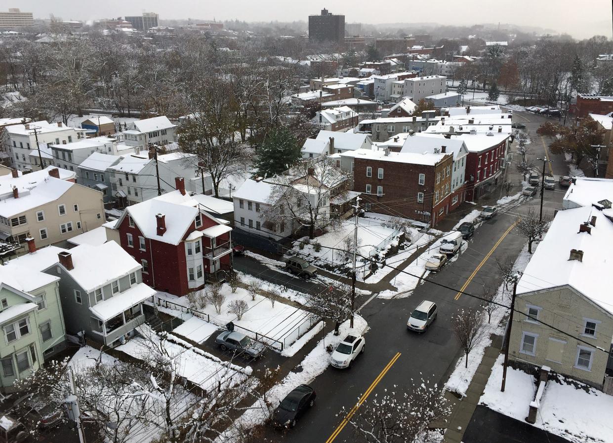 Snow blankets the Mount Carmel neighborhood of the City of Poughkeepsie on Thursday.
