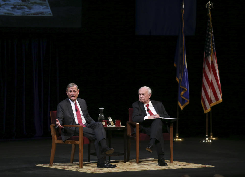 U.S. Supreme Court Chief Justice John Roberts, Jr., left, answers a student's question following his conversation with Professor Robert A. Stein Tuesday, Oct. 16, 2018 at Northrop Auditorium in Minneapolis. Roberts stressed the need for the judicial branch to remain independent, taking note of the tumultuous debate over the confirmation of Associate Justice Brett Kavanaugh to say that the high court makes mistakes when it yields to political pressures. (Jeff Wheeler/Star Tribune via AP)