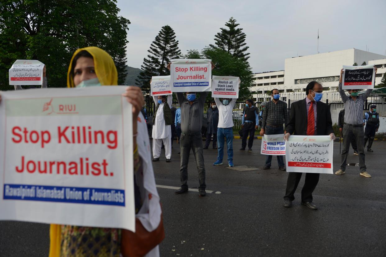 <p>Journalists protest against assaults on the press during the coronavirus lockdown in Pakistan. The country has slipped three places in the World Press Freedom Index</p> (Getty)