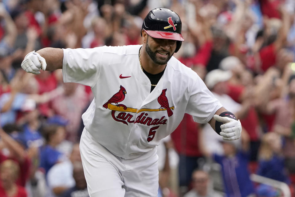 St. Louis Cardinals' Albert Pujols celebrates after hitting a two-run home run during the eighth inning of a baseball game against the Chicago Cubs Sunday, Sept. 4, 2022, in St. Louis. (AP Photo/Jeff Roberson)