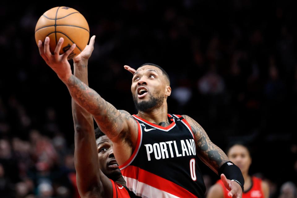 Damian Lillard puts up a shot against the Houston Rockets. Chances are good the shot went in; Lillard scored 71 points Sunday night in Portland's 131-114 win.
