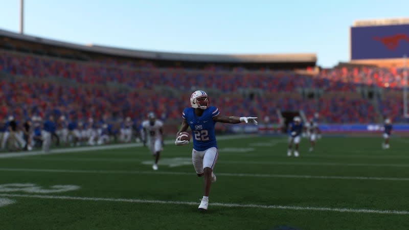 SMU safety Cale Sanders Jr. celebrates as he returns a pick-six during a simulated game between BYU and SMU in the new EA Sports College Football 25 video game. | EA Sports College Football 25