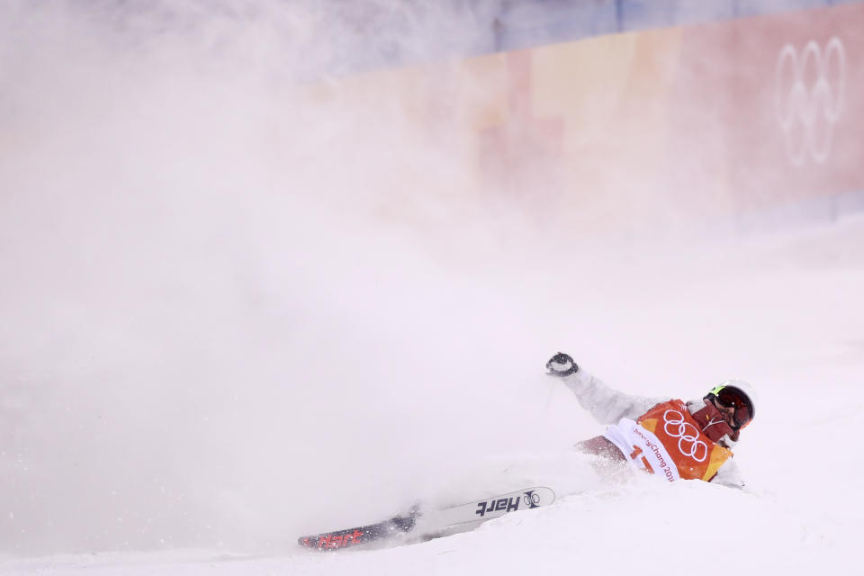 Philippe Marquis crashes out of moguls final.