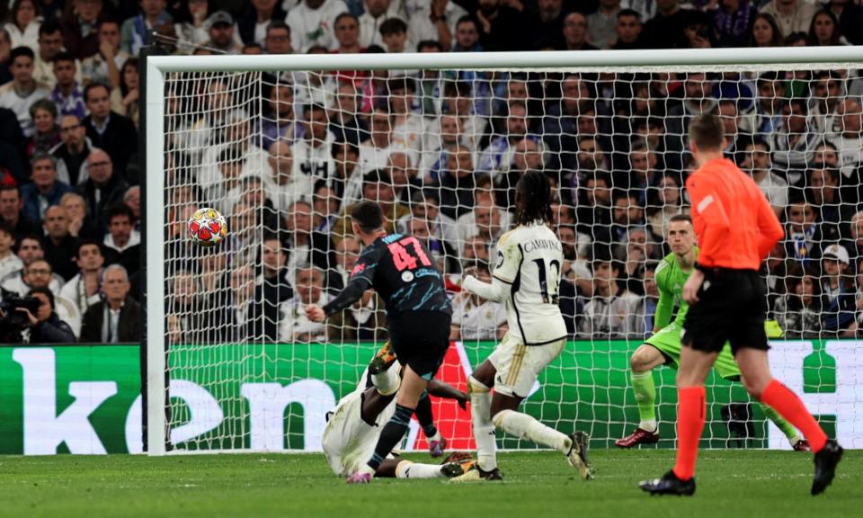 <span>Phil Foden scores Manchester City’s spectacular second in the 3-3 draw in the quarter-final first leg in Madrid.</span><span>Photograph: Violeta Santos Moura/Reuters</span>