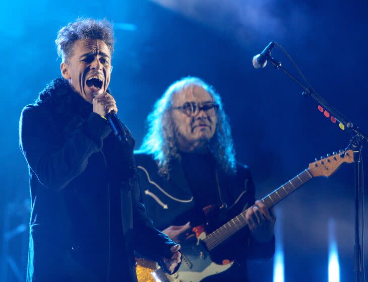 Cafe Tacvba lead singer Ruben Isaac Albarran Ortega performs with the band at the first Besame Mucho Festival, at Dodger Stadium on Saturday, Dec. 3, 2022. More than 50 bands and singers performed on four stages spread out throughout the Dodger Stadium parking lots.