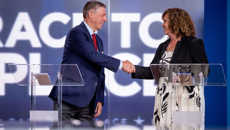 Bruce Hough and Celeste Maloy shake hands at the conclusion of a televised debate at KSL-TV in Salt Lake City on Tuesday, Aug. 15, 2023. The two are running in the GOP primary to replace Rep. Chris Stewart in Utah’s 2nd Congressional District.