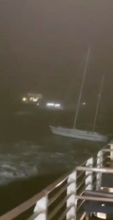 A yach drifts away at sea during storm in Hamilton
