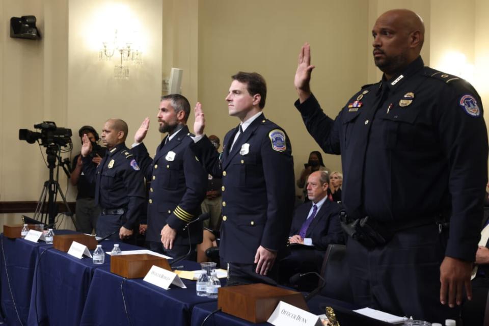 (L-R) Sgt. Aquilino Gonell of the US Capitol Police, Officer Michael Fanone of the DC Metropolitan Police, Officer Daniel Hodges of the DC Metropolitan Police and Private First Class Harry Dunn of the US Capitol Police are sworn in to testify before the House Select Committee investigating the January 6 attack on US Capitol on July 27, 2021 at the U.S. Capitol in Washington, DC. (Photo by Jim Lo Scalzo-Pool/Getty Images)