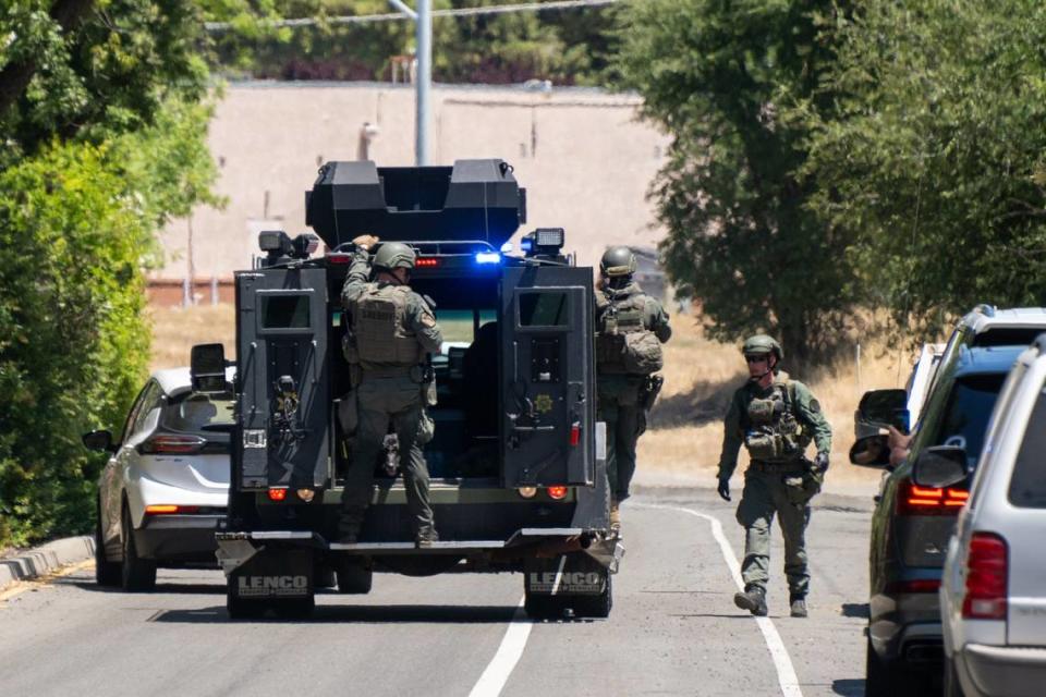 Police officers leave Zion Court in Rocklin after murder suspect Eric James Abril was captured behind the property on Monday, July 10, 2023, a day after he escaped custody from a Roseville hospital. Paul Kitagaki Jr./pkitagaki@sacbee.com