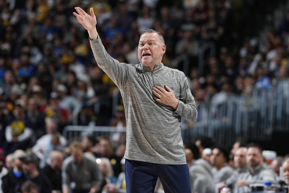 Denver Nuggets head coach Michael Malone directs his team in the first half of an NBA basketball game against the Minnesota Timberwolves Friday, March 29, 2024, in Denver. (AP Photo/David Zalubowski)