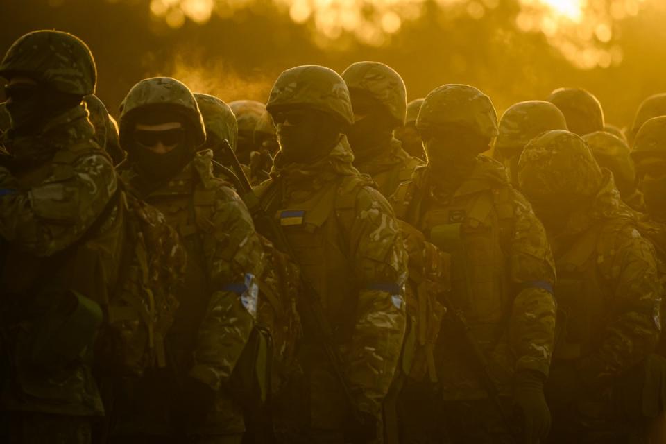 Ukrainian volunteer recruits leave the parade ground after taking part in prayers, blessings and a one minute silence to mark the first anniversary of the 2022 Russian Invasion of Ukraine, on February 24, 2023 in South East England (Getty Images)