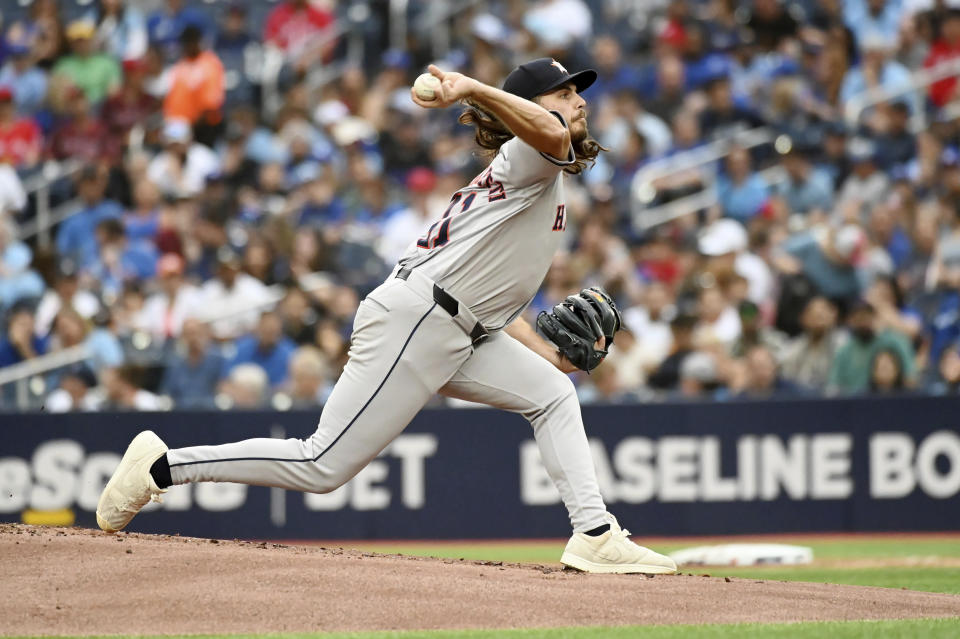 Houston Astros pitcher Spencer Arrighetti (41) works against the Toronto Blue Jays during the first inning of a baseball game, Tuesday, July 2, 2024, in Toronto. (Jon Blacker/The Canadian Press via AP)