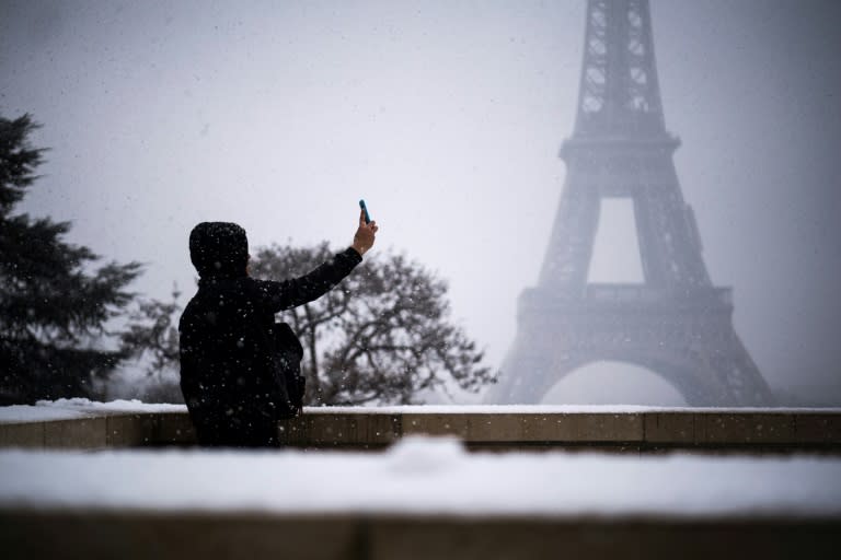 The French capital got its first snow flurries of the season on Monday