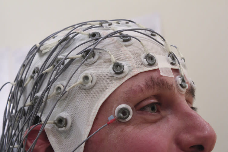 <span class="caption">EEG recording cap.</span> <span class="attribution"><span class="source">Chris Hope/wikipedia</span>, <a class="link " href="http://creativecommons.org/licenses/by-sa/4.0/" rel="nofollow noopener" target="_blank" data-ylk="slk:CC BY-SA;elm:context_link;itc:0;sec:content-canvas">CC BY-SA</a></span>