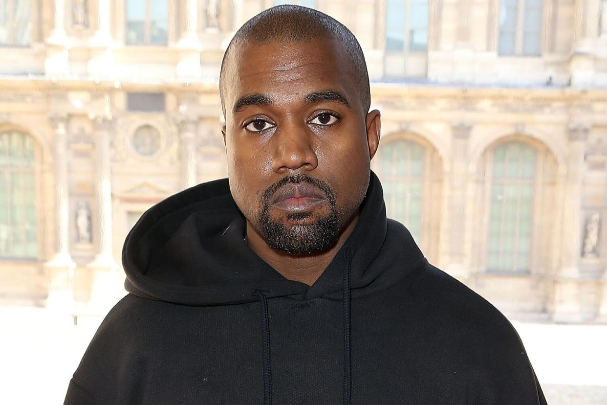 Kanye West attends the Christian Dior show as part of the Paris Fashion Week Womenswear Fall/Winter 2015/2016 at Cour Carree du Louvre on March 6, 2015 in Paris, France.