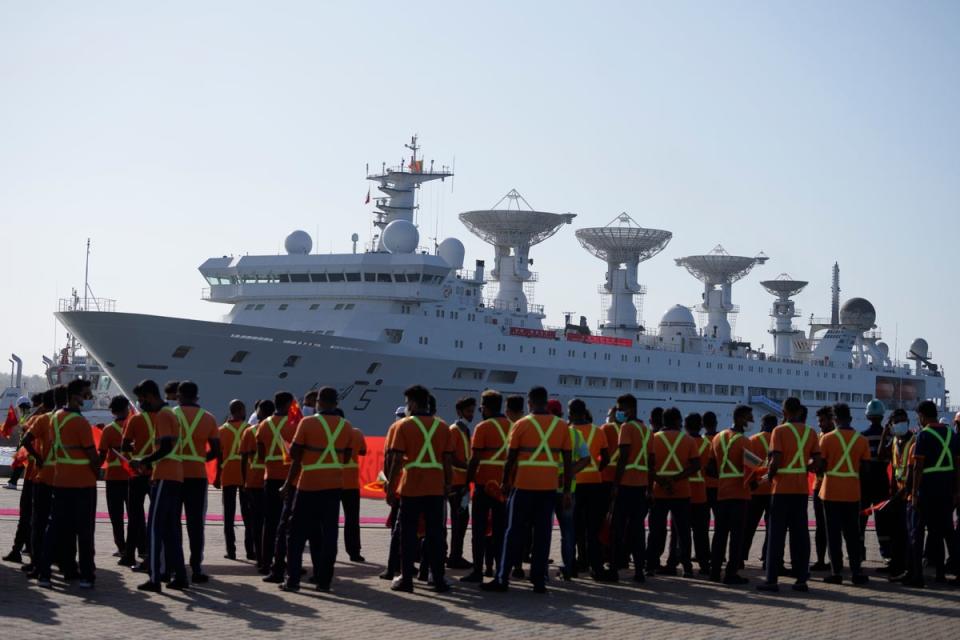 Yuan Wang 5, a Chinese scientific research ship, arrives at the port in Hambantota, Sri Lanka, Tuesday on 16 August 2022 after an earlier port call was deferred due to apparent security concerns (AP)