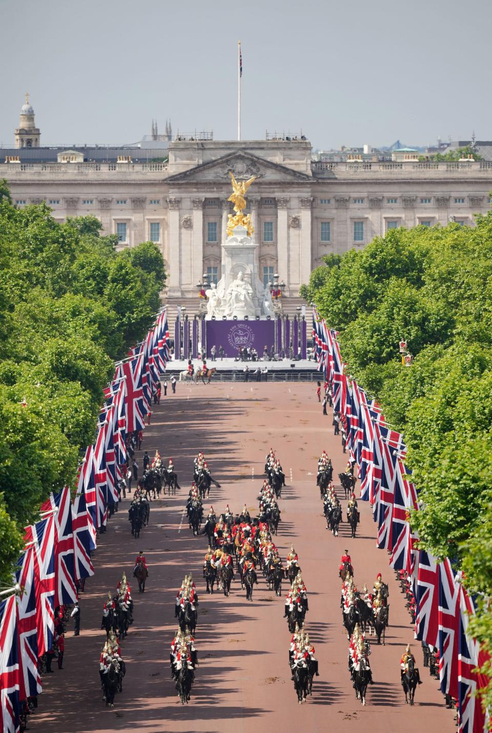 Scenes on The Mall as the Royal Procession prepares to leave Buckingham Palace for the Trooping the Colour ceremony at Horse Guards Parade (PA)