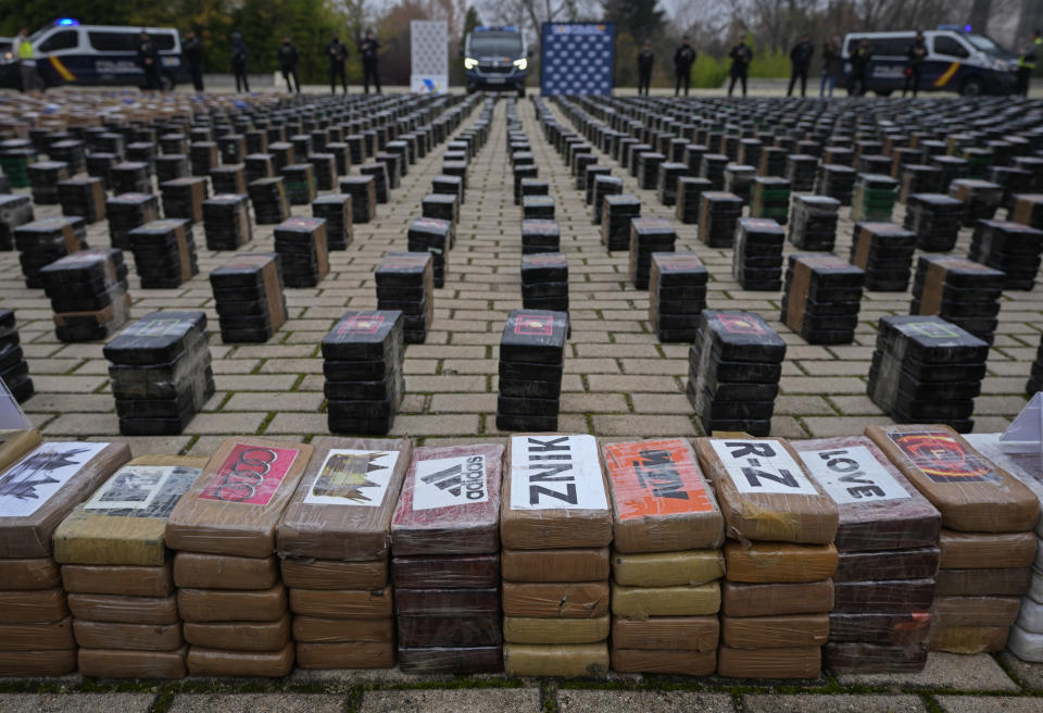 Part of a haul of 11 tons of cocaine is displayed in the patio of a police station in Madrid, Spain, Tuesday, Dec. 12, 2023. Spanish authorities say that they have confiscated 11 tons of cocaine and arrested 20 people in two different operations against the smuggling of the illegal drugs inside shipping containers. Investigators believe that the criminal organization was using a frozen seafood company as a front to bring the drug from South America.(AP Photo/Paul White)