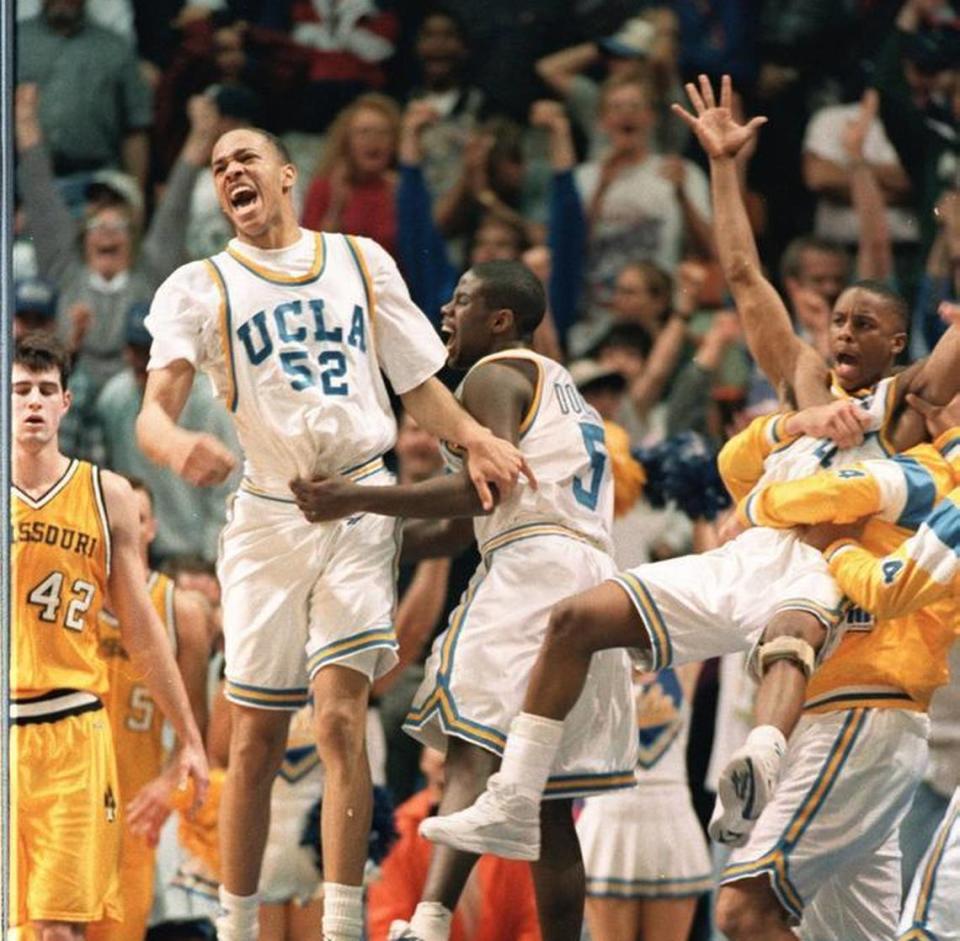 The ecstatic UCLA bench hoisted Tyus Edney, right, in celebration after his iconic game-winning shot on March 20, 1995, against the Missouri Tigers in Boise, Idaho.