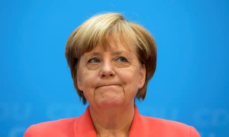 German Chancellor and chairwoman of the Christian Democratic Union (CDU) Angela Merkel addresses a news conference in Berlin, Germany September 19, 2016. REUTERS/Fabrizio Bensch