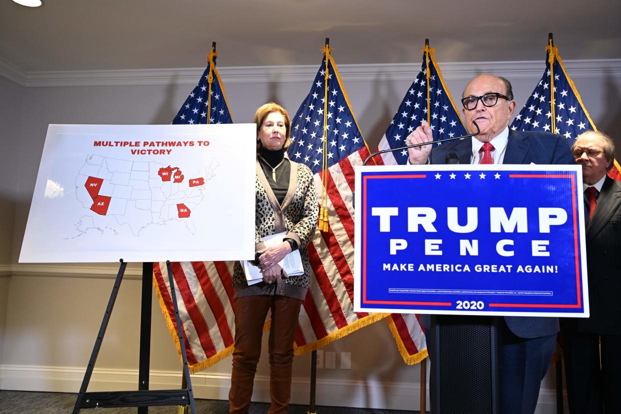Trump's personal lawyer Rudy Giuliani speaks during a press conference at the Republican National Committee headquarters in Washington, DC, on November 19, 2020. (Photo by MANDEL NGAN / AFP) (Photo by MANDEL NGAN/AFP via Getty Images) (AFP via Getty Images)