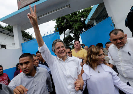 Ecuadorean presidential candidate Guillermo Lasso waves to supporters after casting his vote during the presidential election in Guayaquil, Ecuador April 2, 2017. REUTERS/Henry Romero
