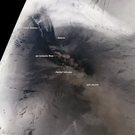 A pyroclastic flow, a superheated, fluid mix of gas, lava and melted snow, raced down the slopes of Alaska's Pavlof volcano after it erupted May 13, 2013.